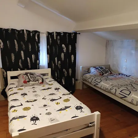 Chambre3 Lits Simples Cuisine Commune Проживание в семье *